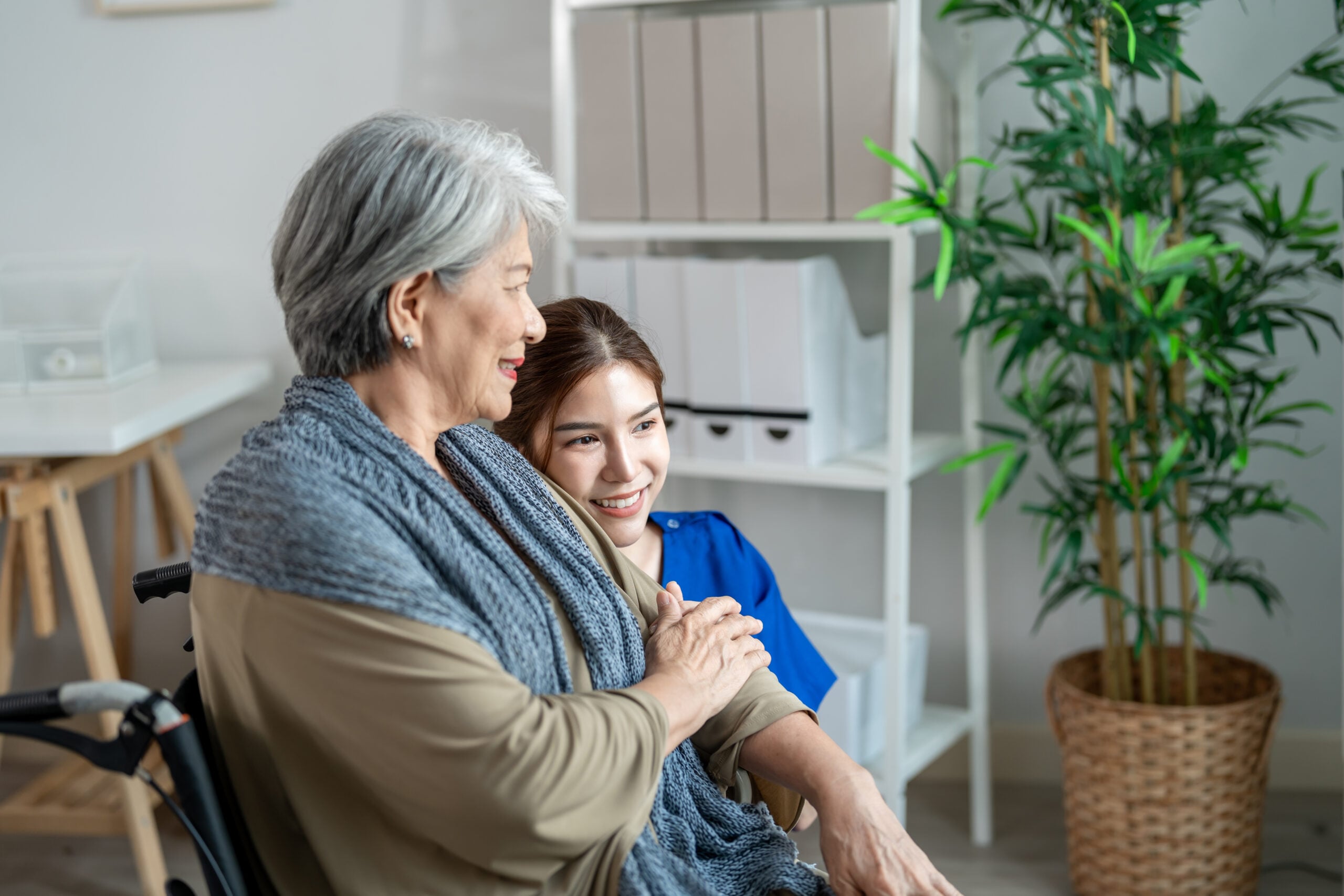 In-Home Care in Malvern Certified in home caregiver providing emotional support and companionship for senior in Malvern AR living room